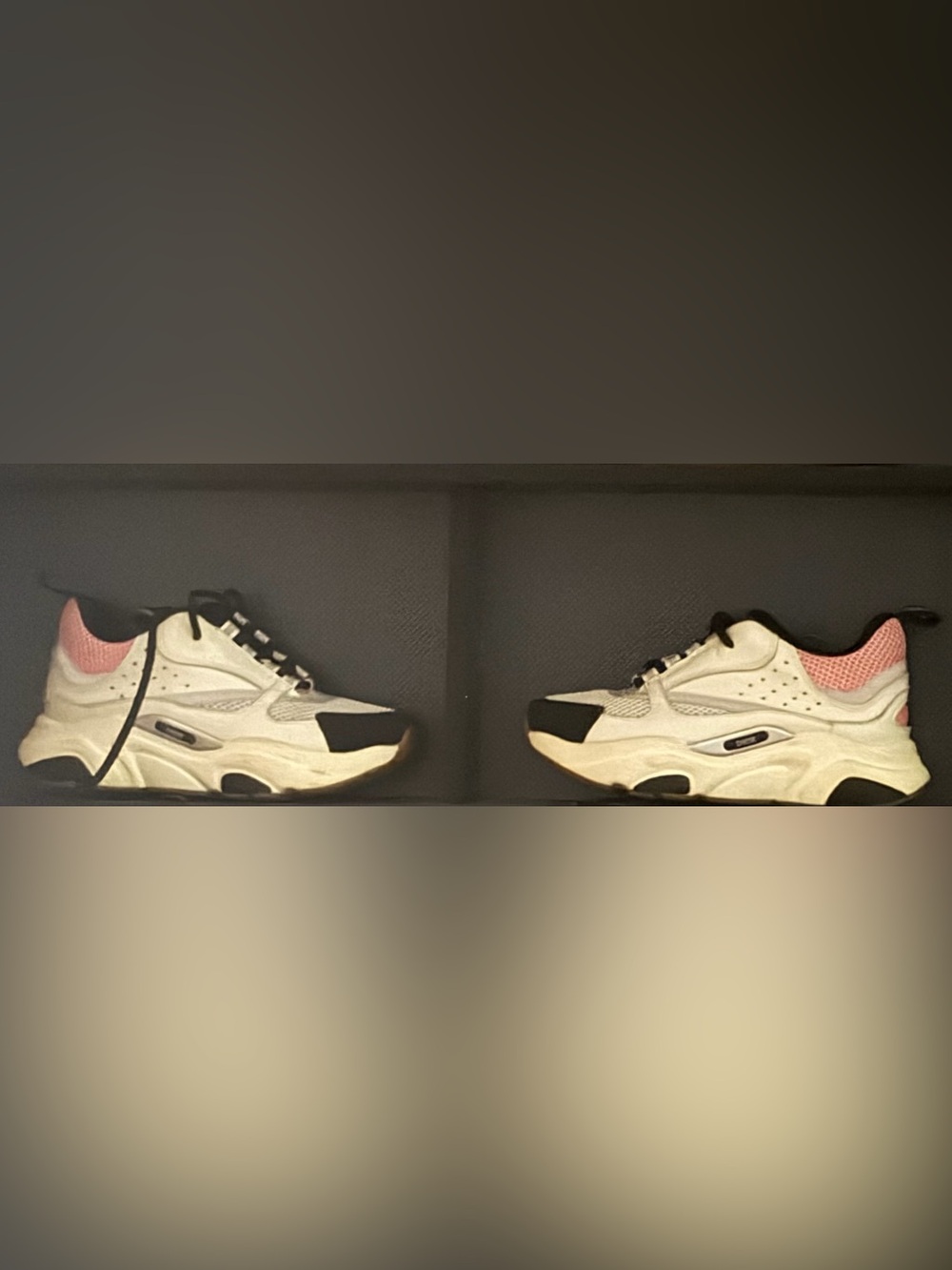 Dior B22 sneakers in a white, black, and pale pink colorway
